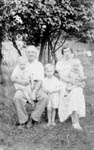 Tom Curtis & family, Pump Square, 1937